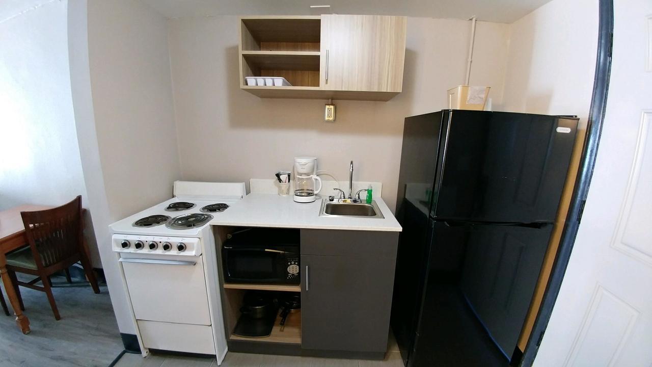 Garden City Inn Bagian luar foto