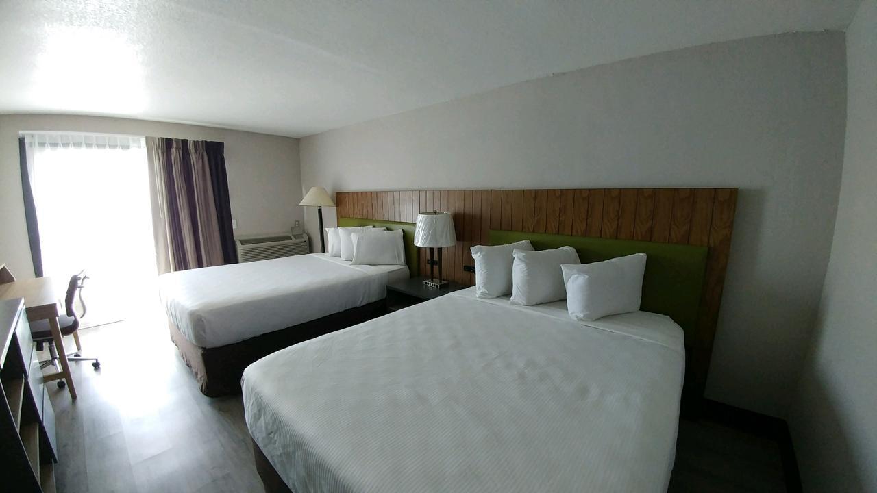 Garden City Inn Bagian luar foto